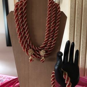 TRIPLE LAYERED RED RUSSIAN NECKLACE.